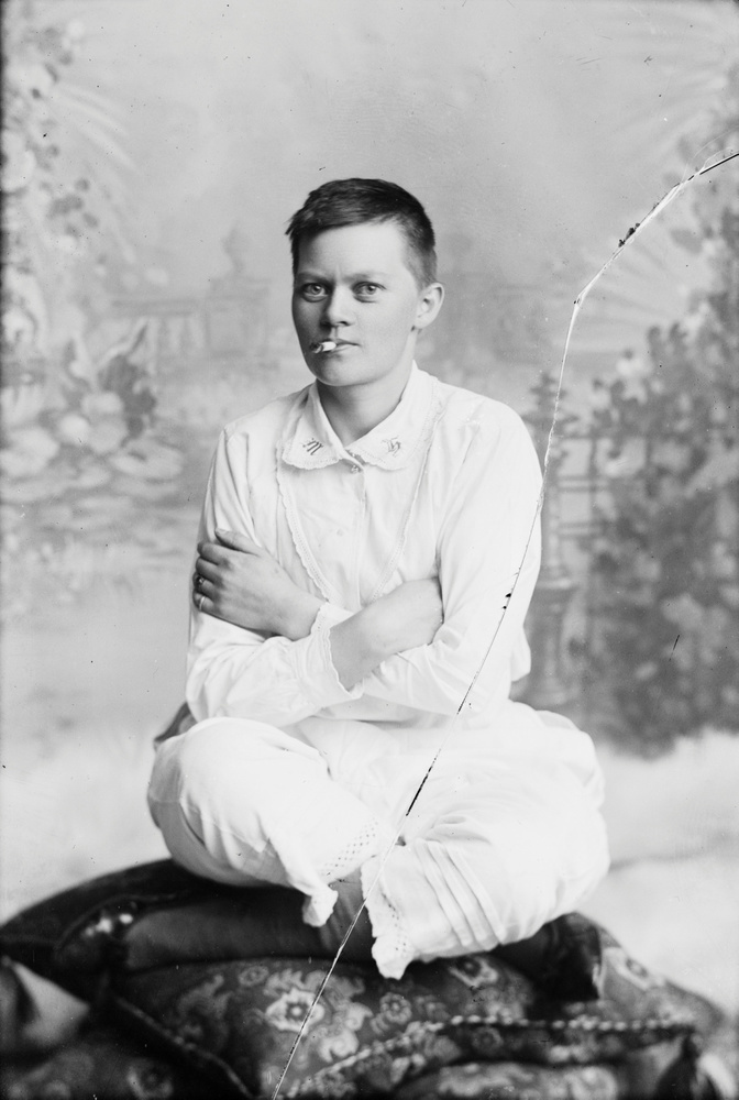 Marie Høeg Sitting in Underwear with a Cigarette