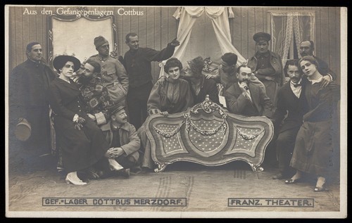 Download the full-sized image of French prisoners of war performing a play at a prisoner of war camp in Cottbus. Photographic postcard by P. Tharan, 1916-1917.