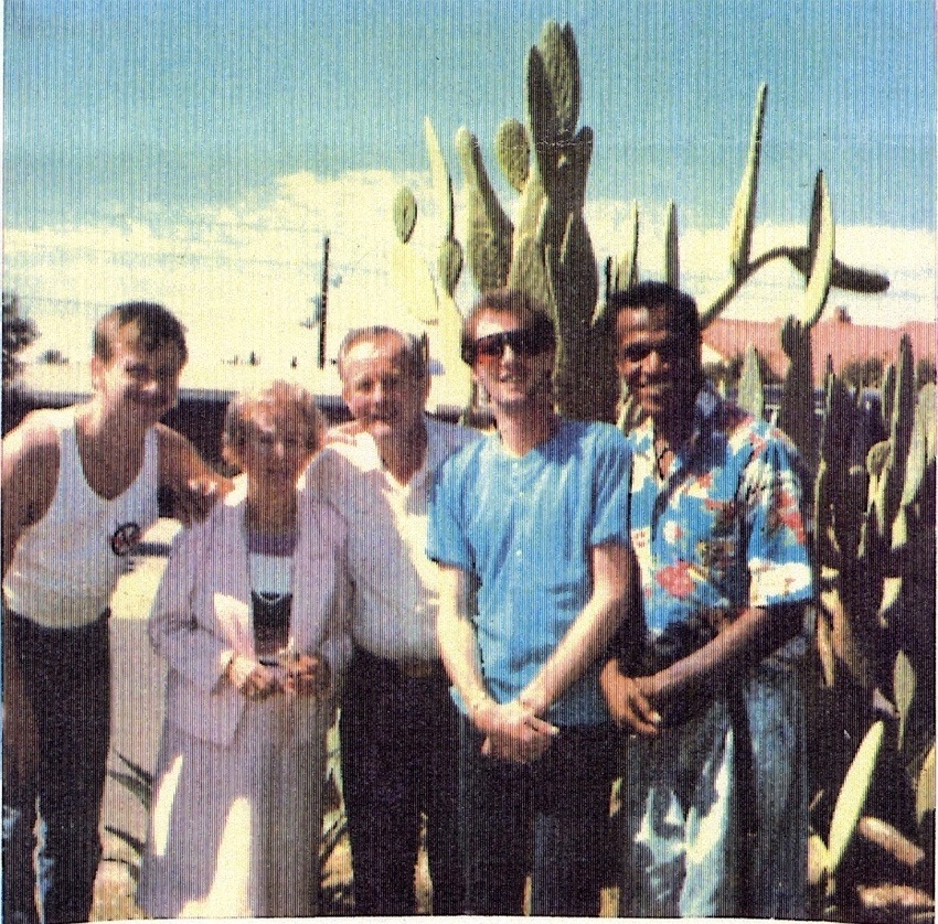 Download the full-sized image of A Photograph of Marsha P. Johnson Posing in Front of Cacti with Willie Brashears, Randy Wicker, and George Flimlin