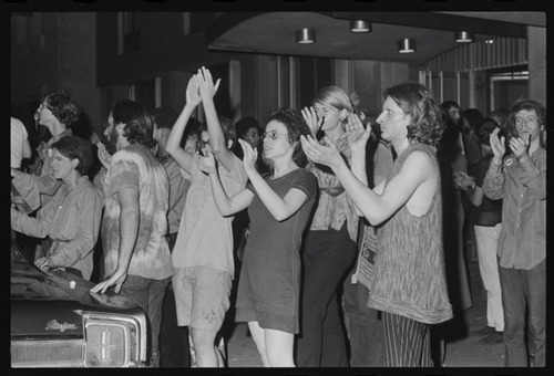 Download the full-sized image of Photographs of Sylvia Rivera at the Front of a Group of Clapping Protesters