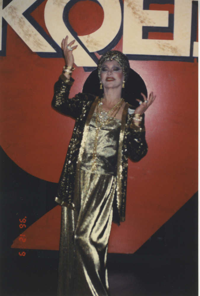 Download the full-sized image of Photograph of Alexis Francois in Shiny Gold Dress